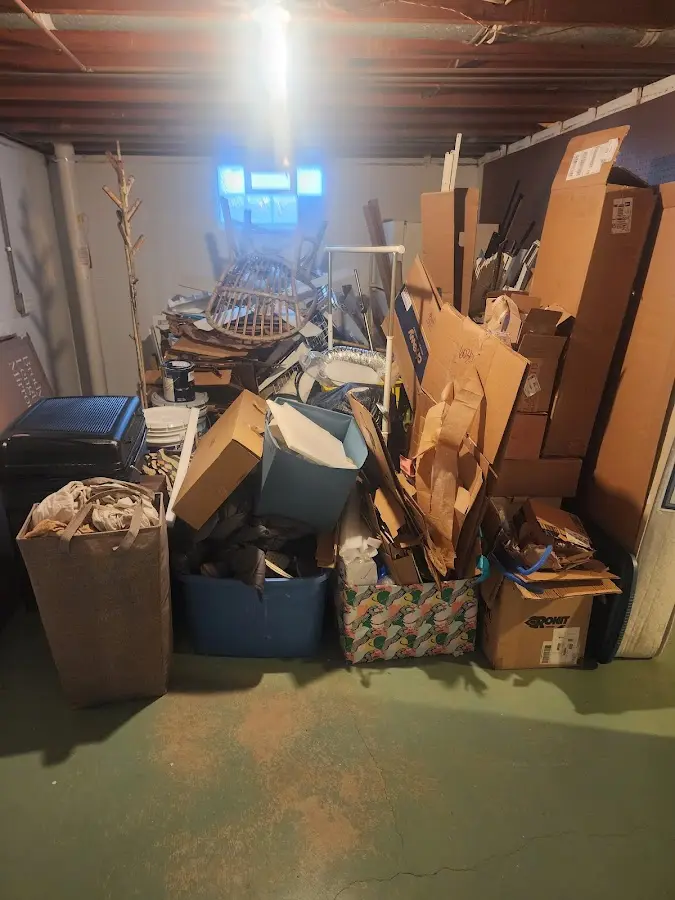 Roll-off dumpster container at job site for 20 Yard Dumpster Rental in Palmetto Bay